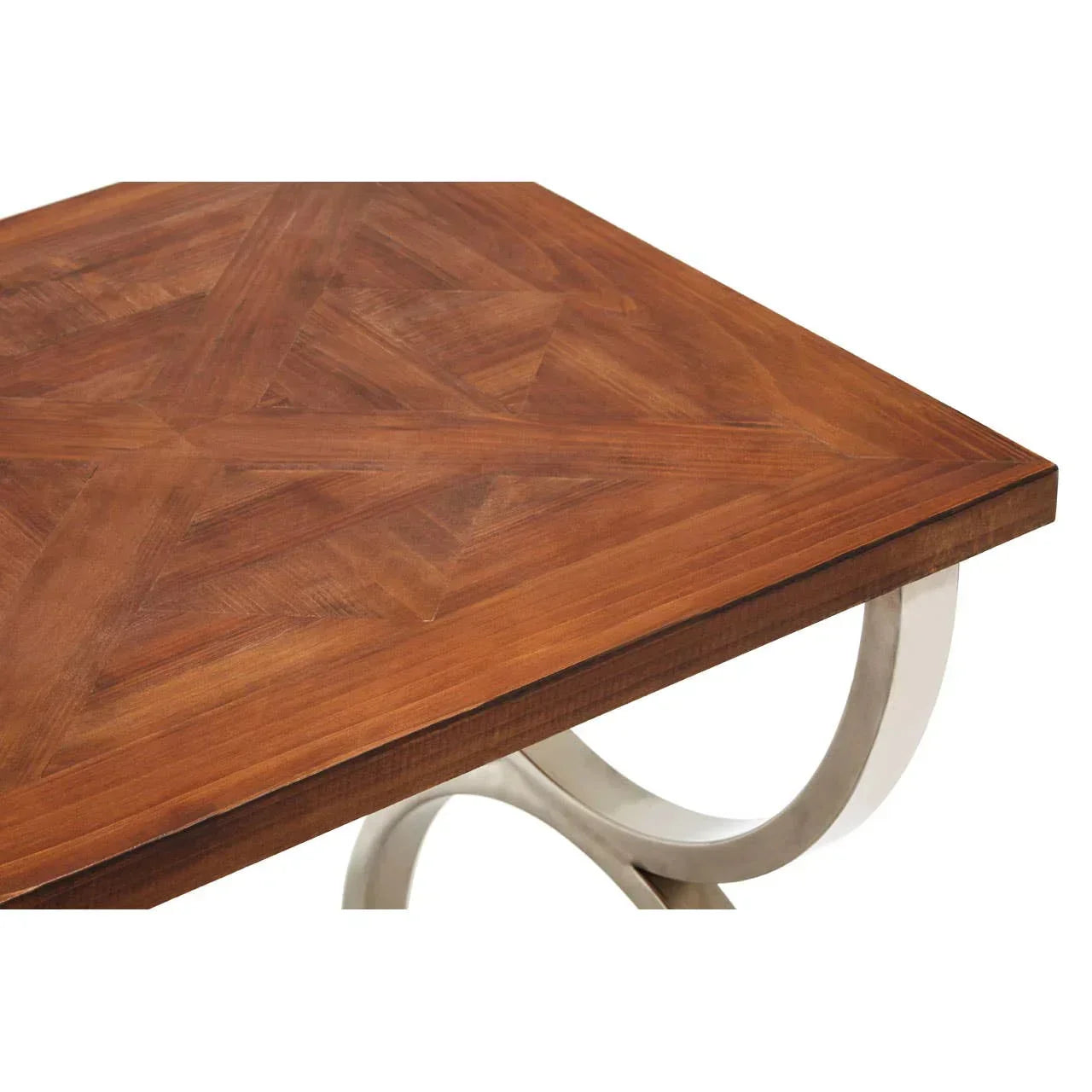 Wooden dining table with geometric inlay top and curved metal legs, corner view