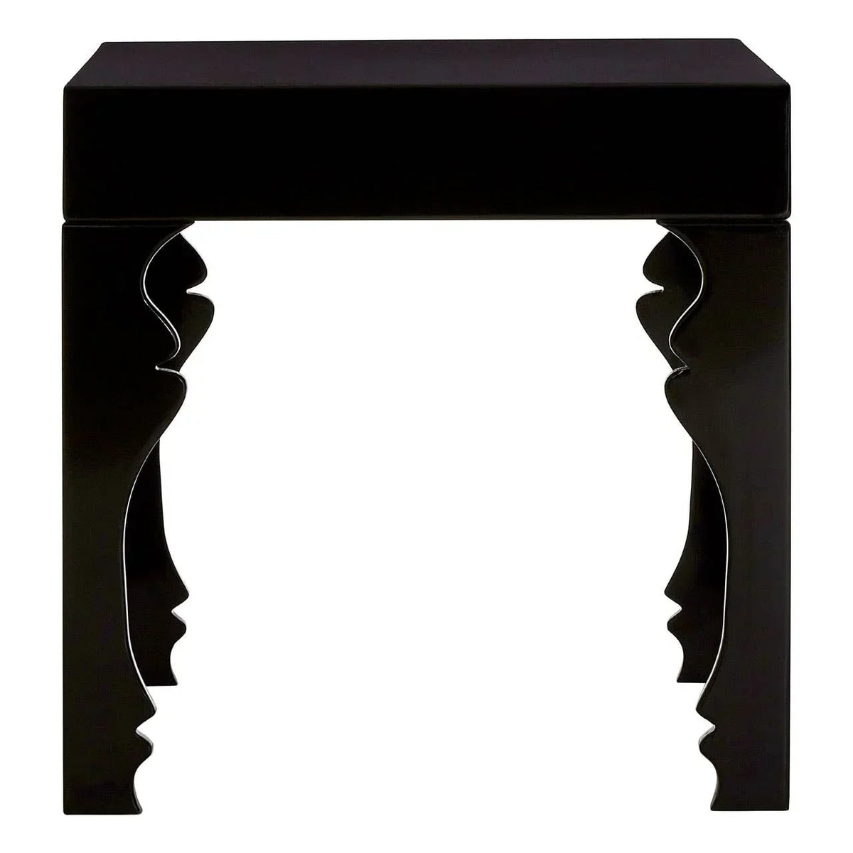 Black side table with sculpted legs featuring abstract face profiles, front view