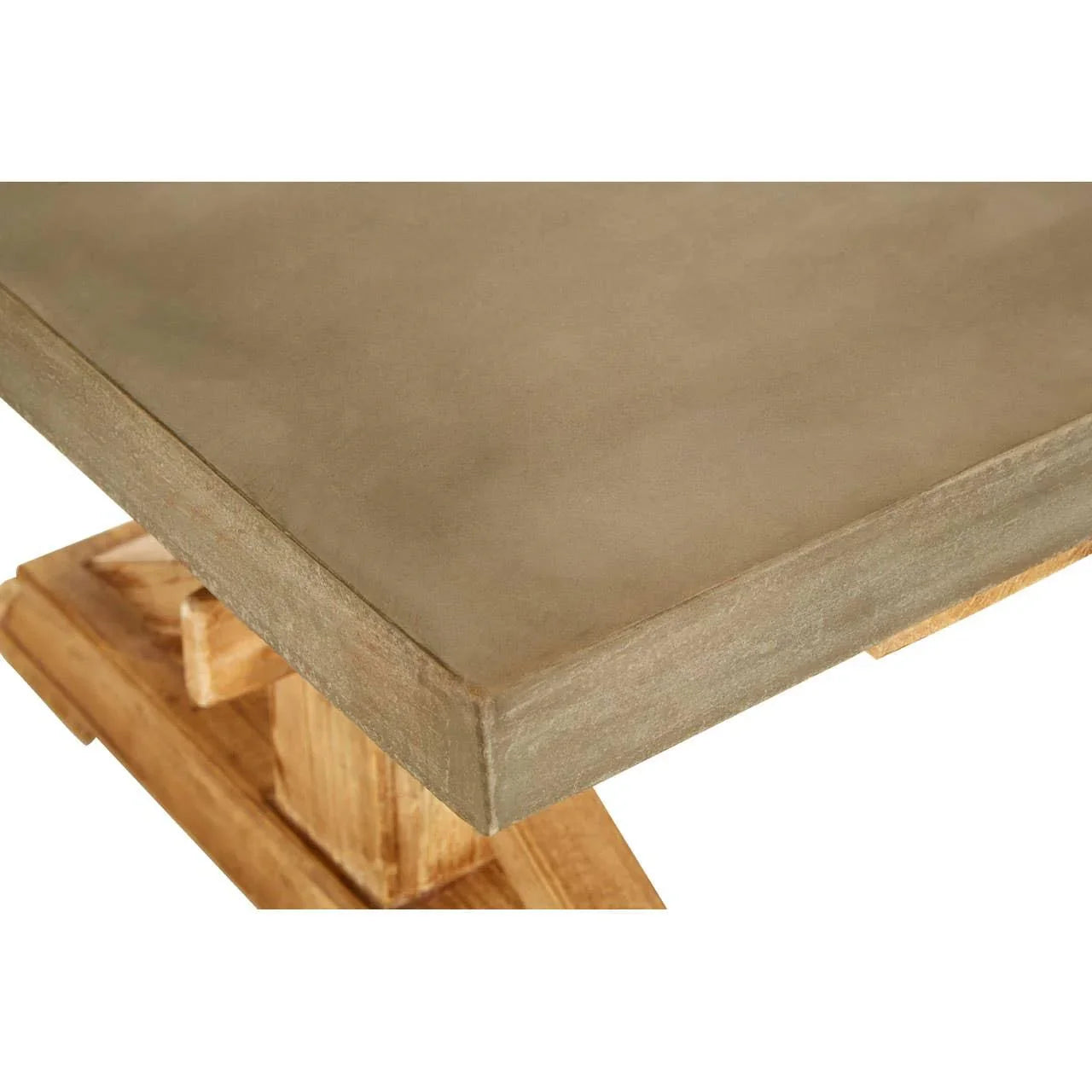 Closeup of rectangular dining table with concrete top and wooden base