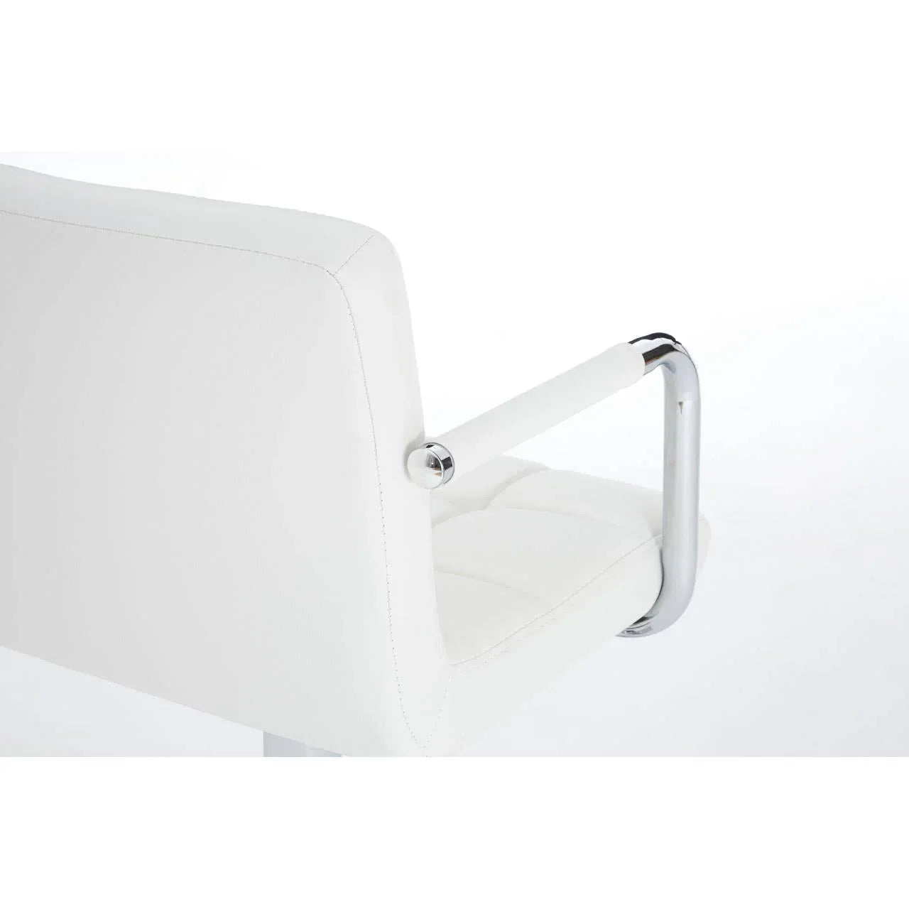 White faux leather dining chair with chrome armrest detail, rear side view