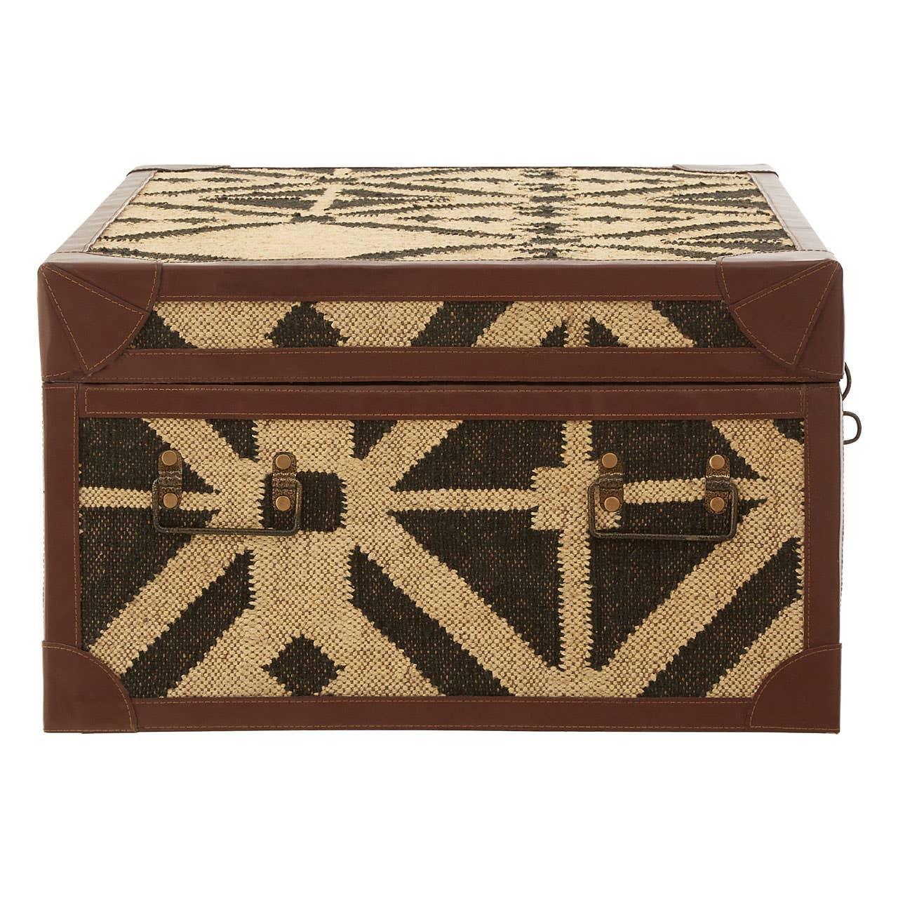 Woven storage trunk with geometric black and beige pattern and brown leather corners