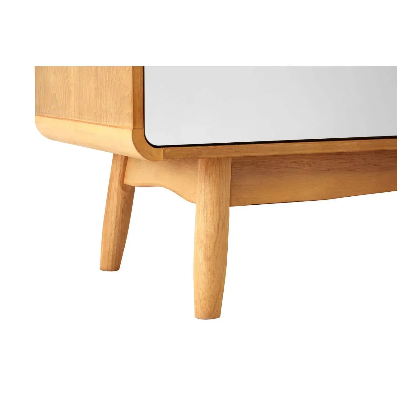 Close-up of wooden cabinet with angled legs and glossy white panel
