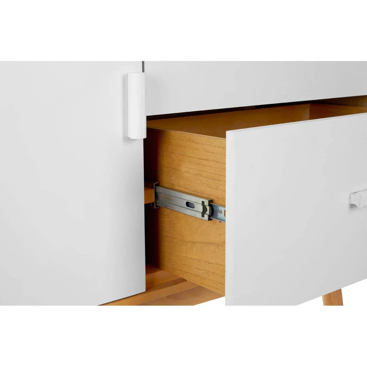 White wooden sideboard drawer partially open showing metal drawer runner detail