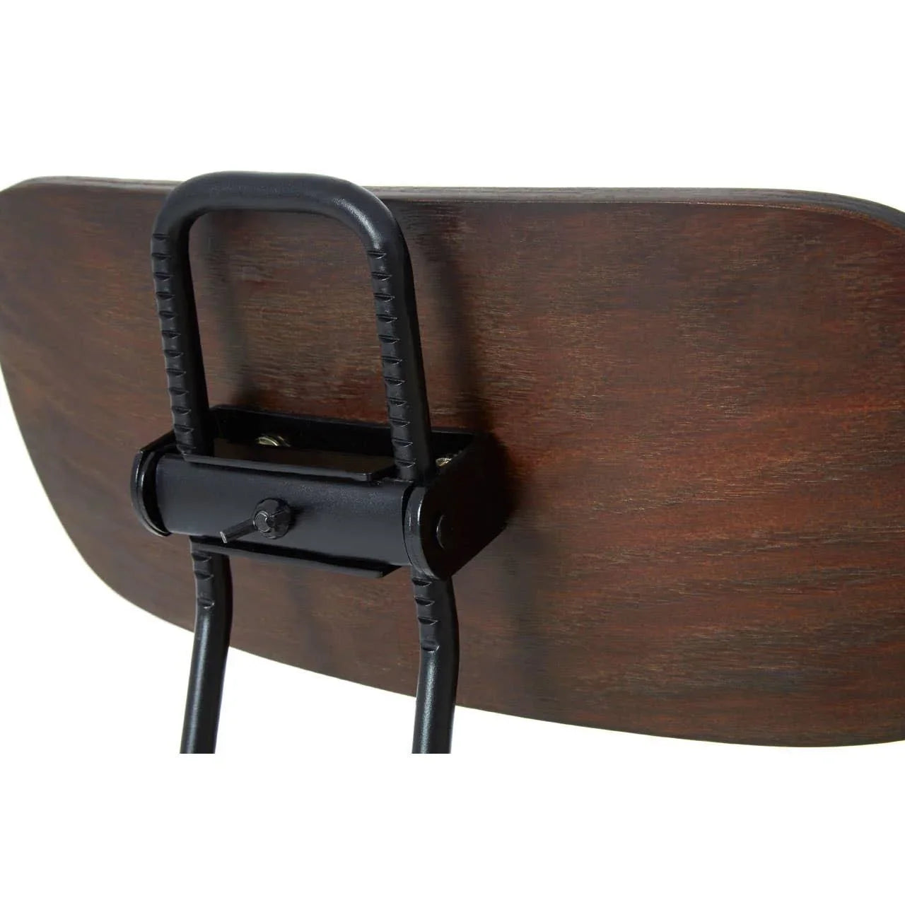 Close-up of wooden dining chair backrest with black metal frame and support detail