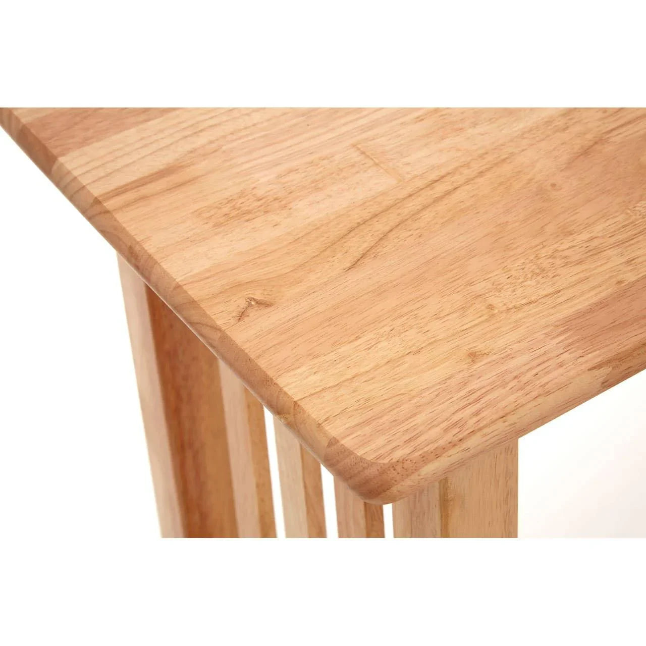 Light wood table with smooth corner and visible natural grain detail