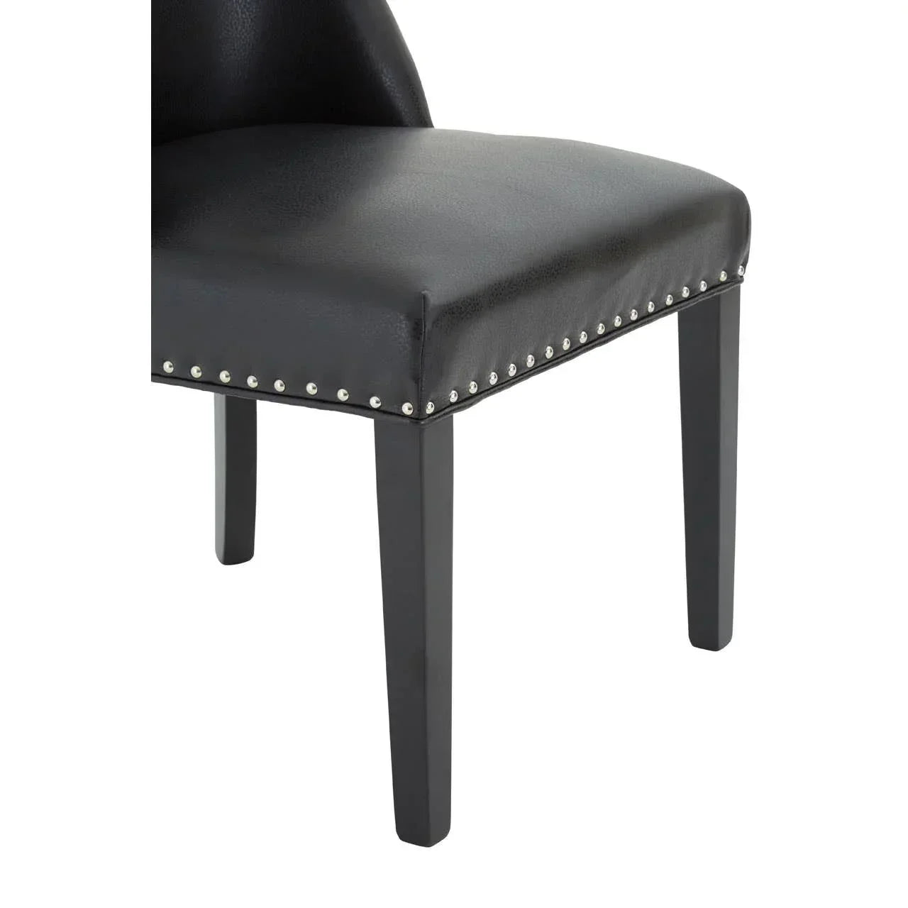 Black dining chair with faux leather seat, stud detail and wooden legs