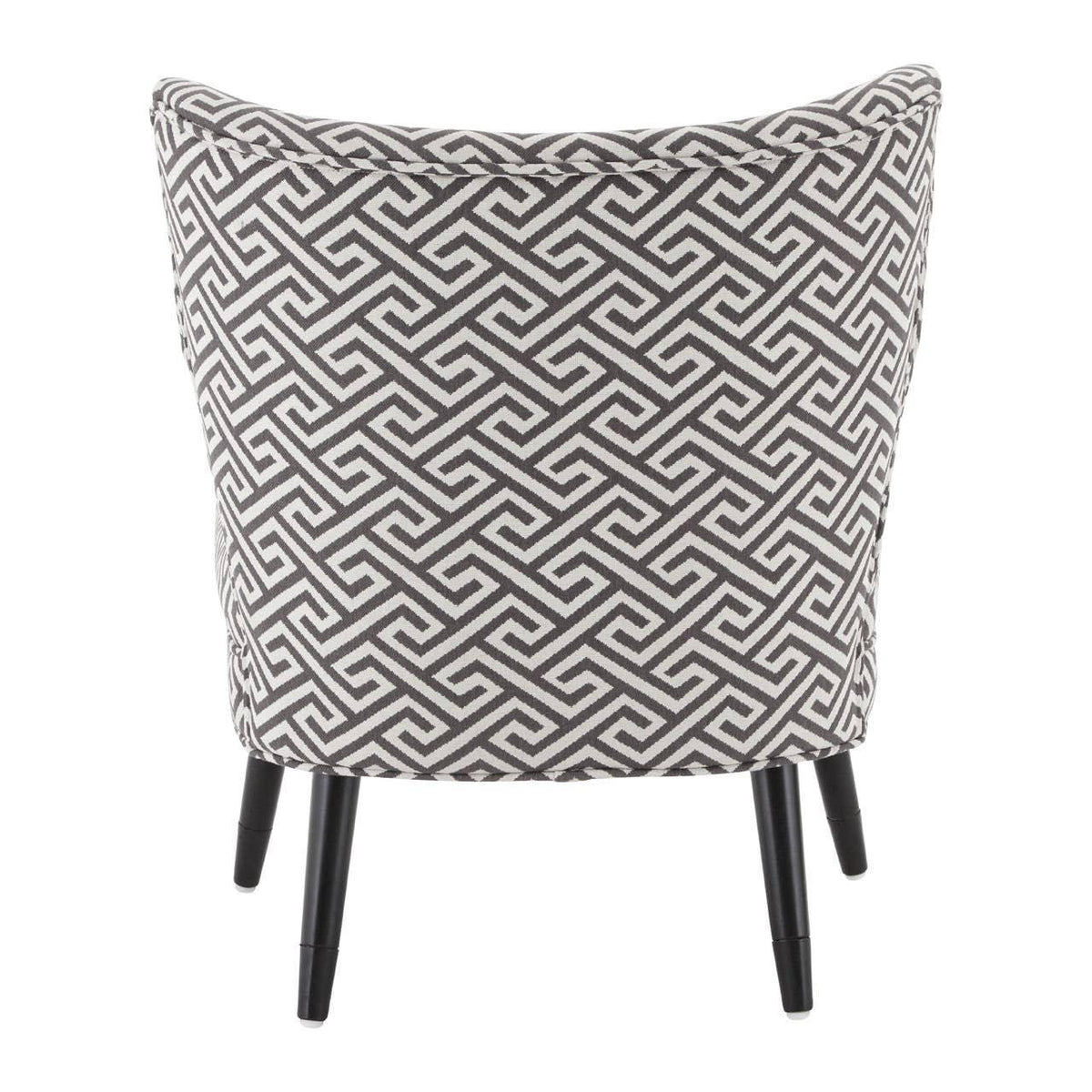 Accent chair with black and white geometric upholstery, rear view, black wooden legs