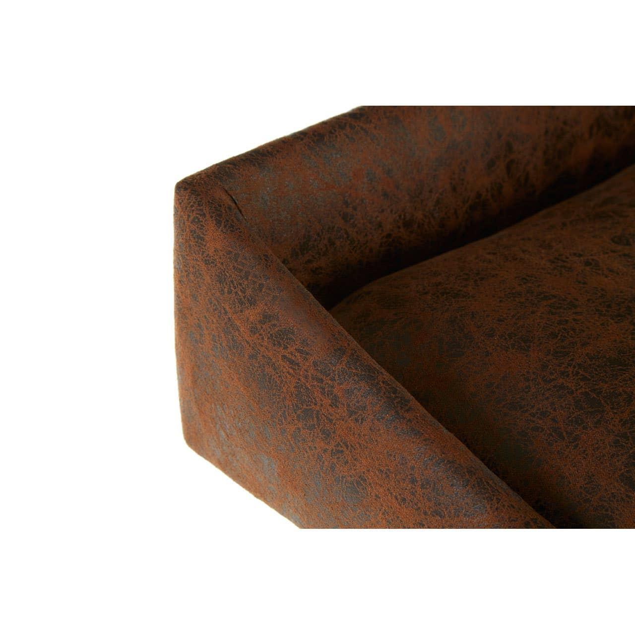 Close-up of brown faux leather sofa armrest with textured finish and soft cushion
