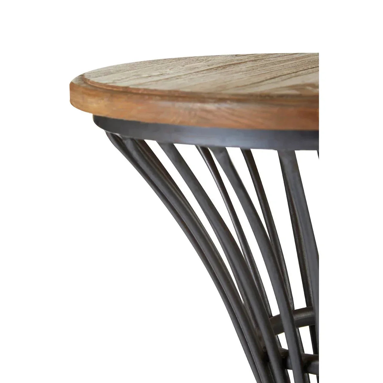 Closeup of round wooden table top with black metal frame and curved legs