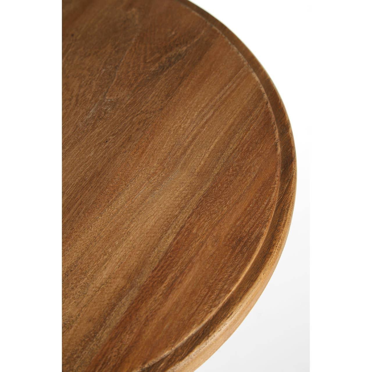 Close-up of round wooden table top with natural grain detail
