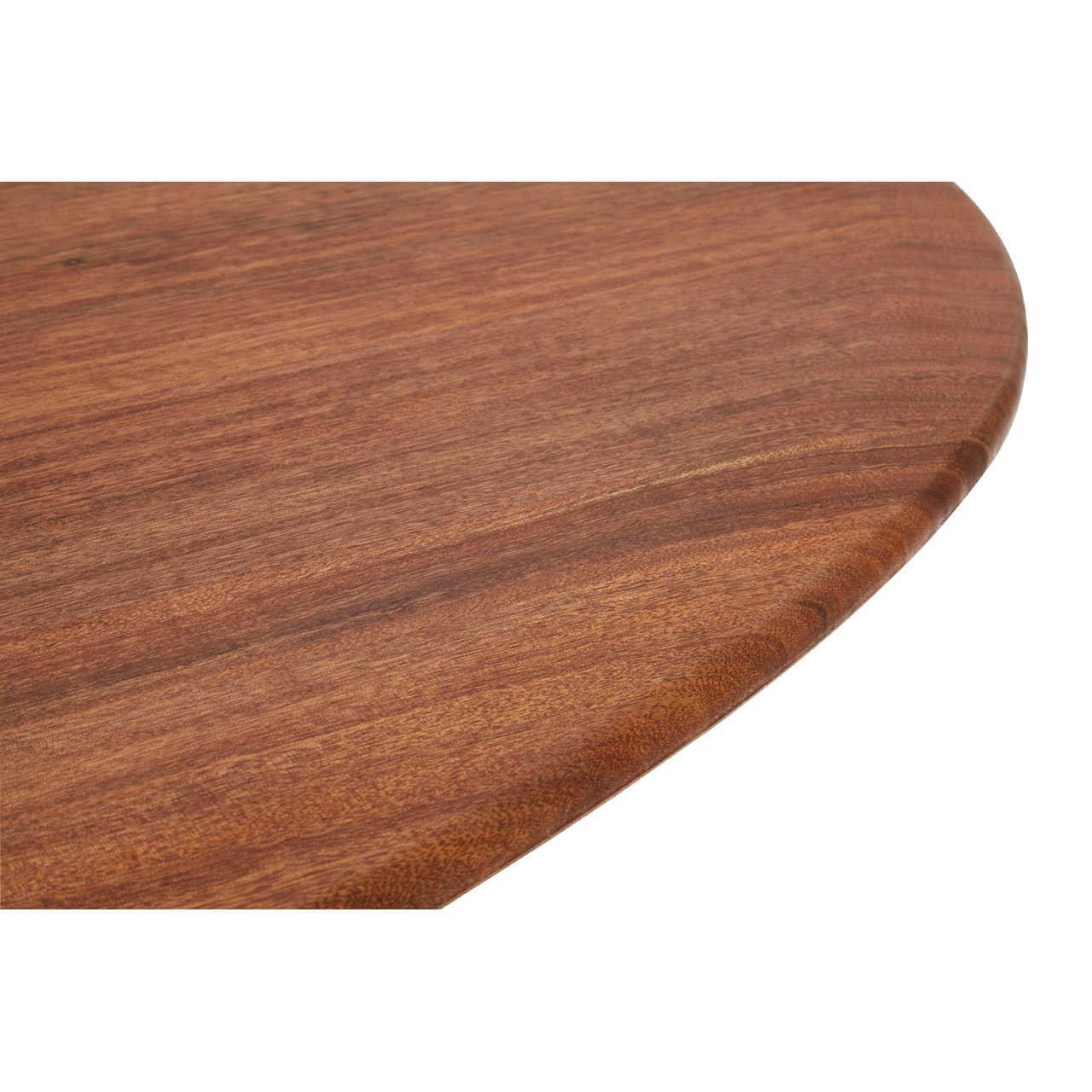 Closeup of a round wooden dining table top with smooth natural finish