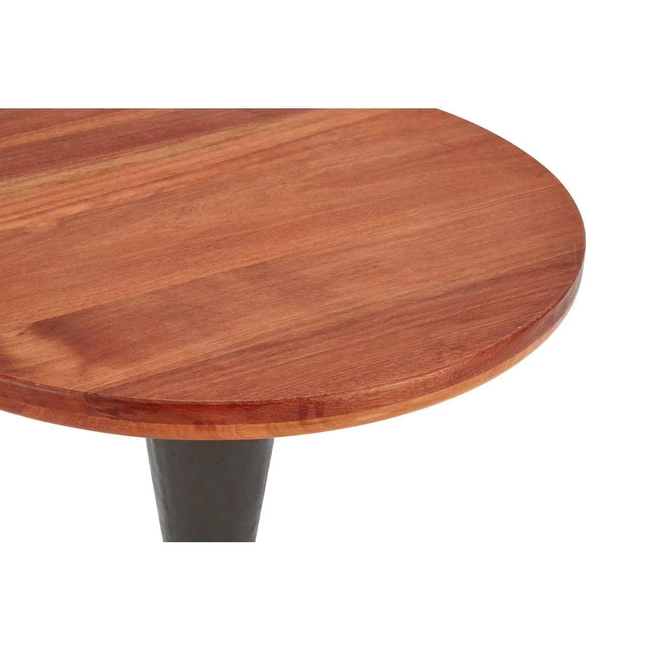 closeup of round wooden table top with visible grain and black metal leg