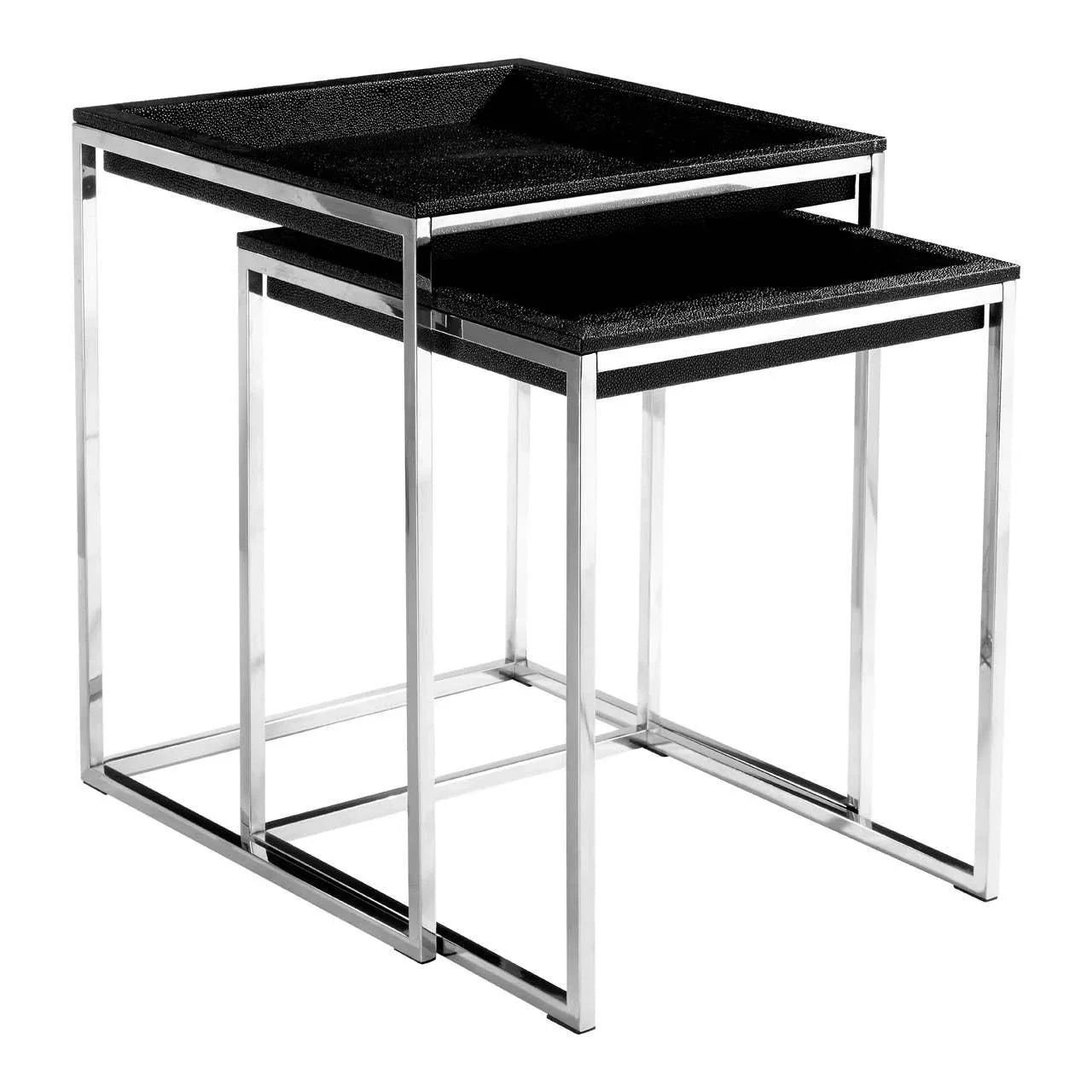 Black nesting tables with tray tops and chrome legs set on white background