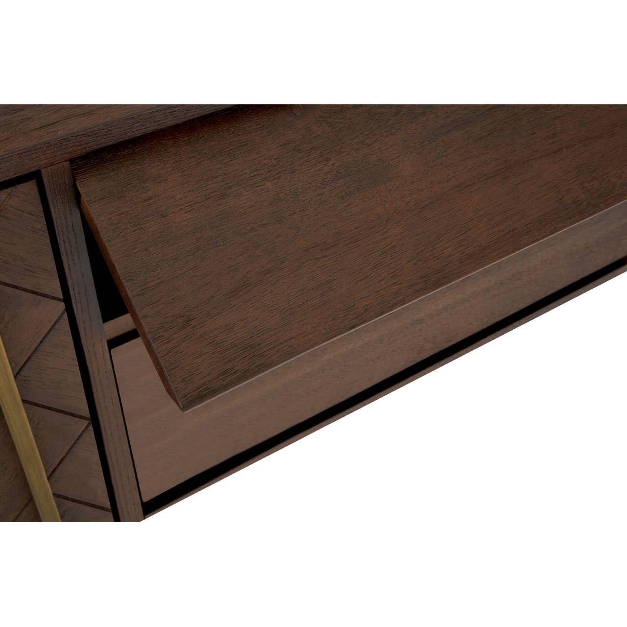 Closeup of dark wood chest of drawers with smooth front panel and open drawer
