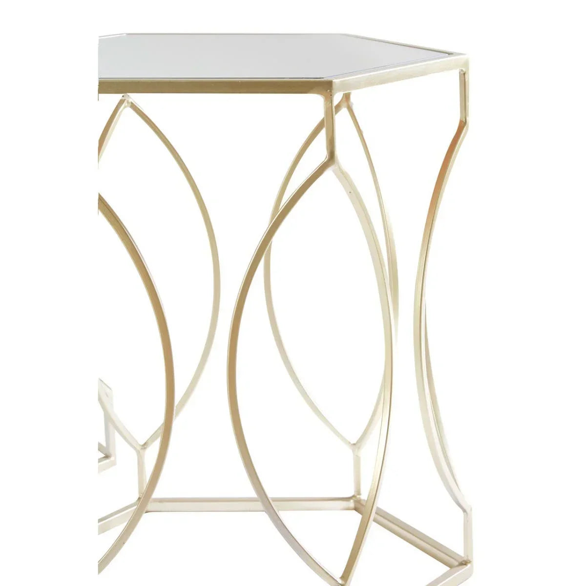 Gold metal side table with geometric frame and glass top, partial side angle view