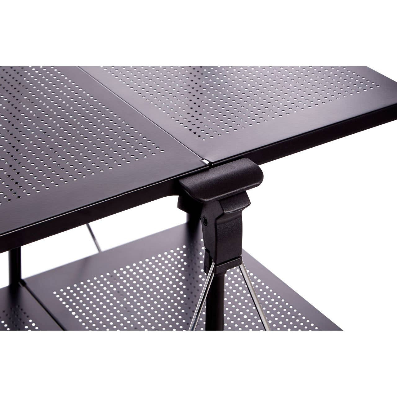 Close-up view of the Harlow Black Rectangular Folding Kitchen Trolley, showcasing the sleek black surface and the folding mechanism. The trolley features a textured design on the tabletop and a sturdy support structure underneath, highlighting its functional and modern design