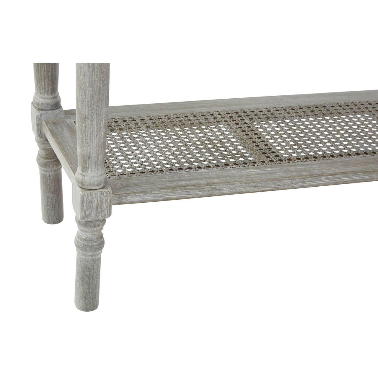 Wooden furniture lower shelf with cane webbing detail and turned legs