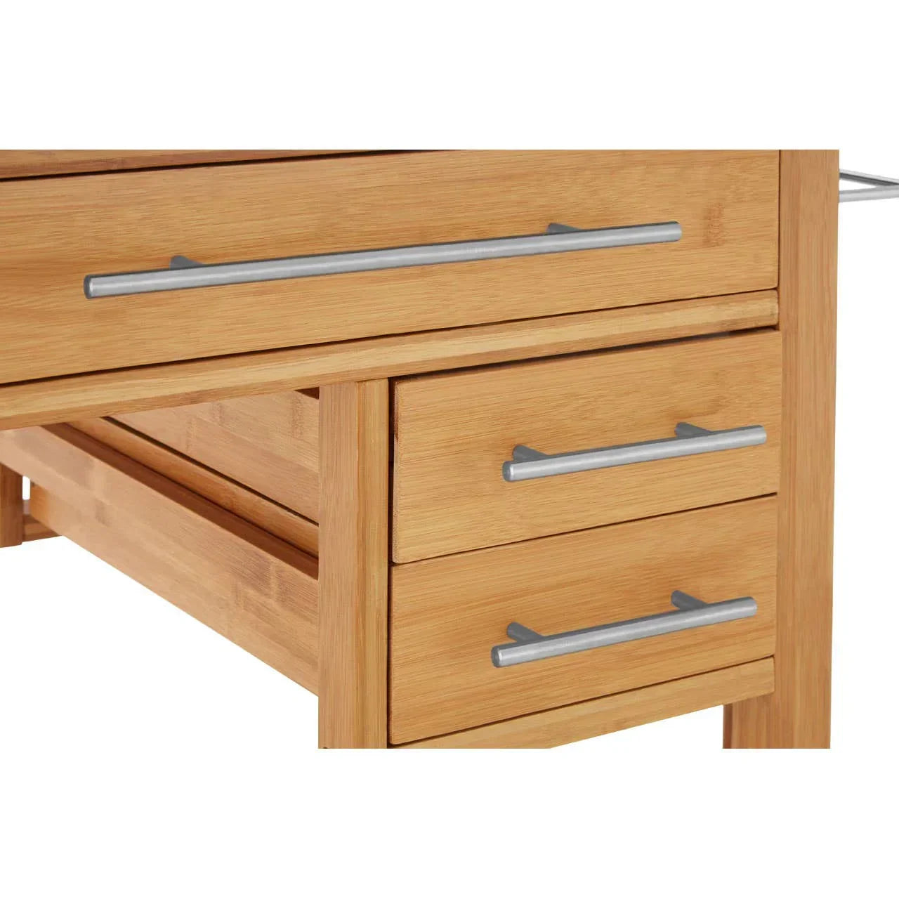 Oak wood desk drawers with silver metal handles, close-up of modern furniture detail