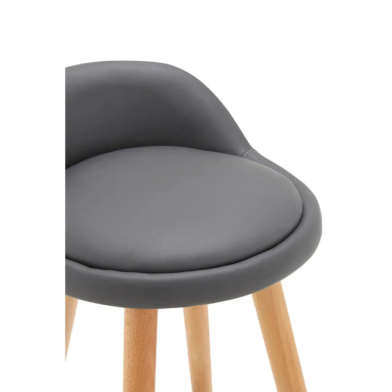 Close-up of grey dining chair seat with wooden legs and curved backrest