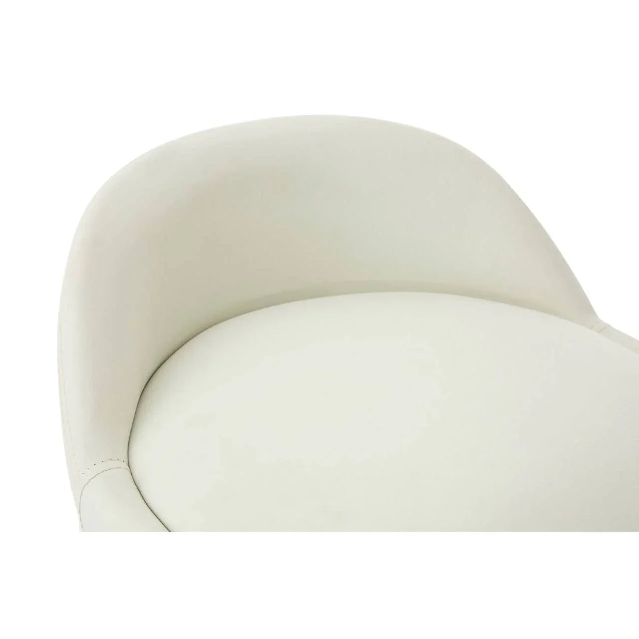 Close-up of cream dining chair with curved backrest and smooth upholstered seat