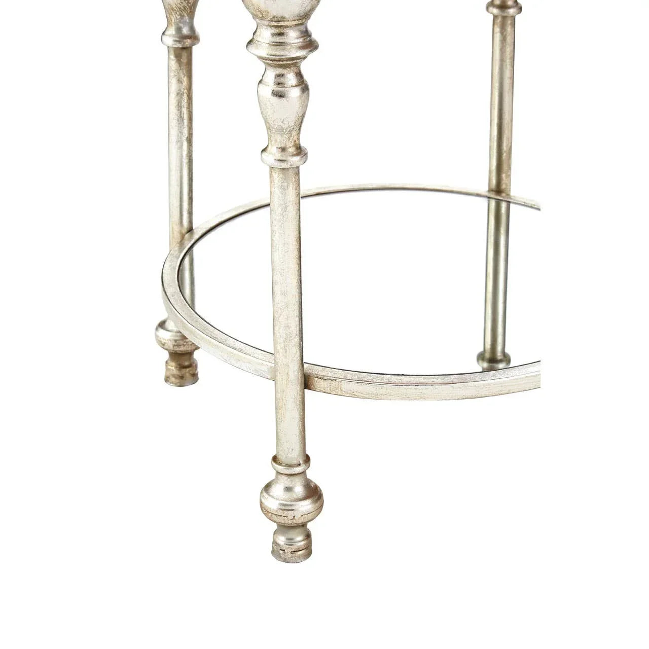 Silver metal table legs with round frame and carved detailing