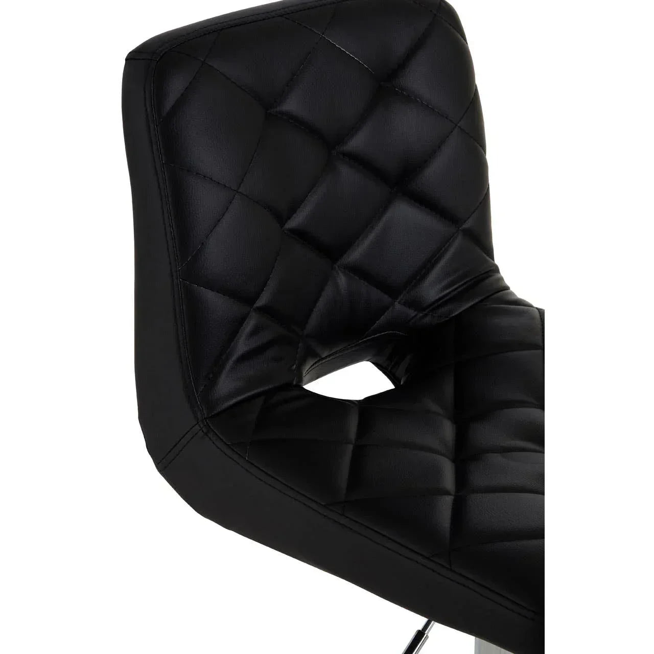 Black faux leather bar stool with diamond stitching and chrome base detail close-up