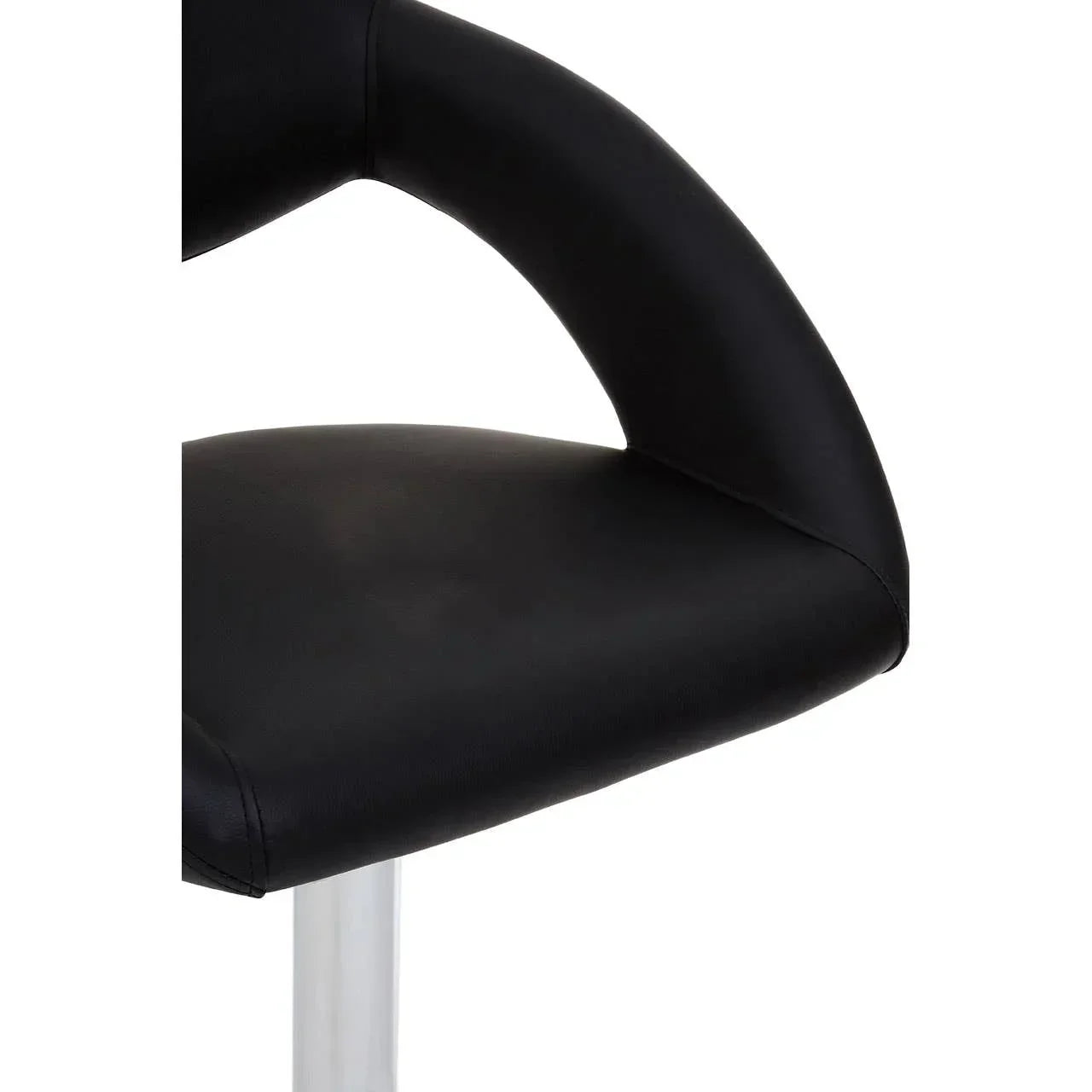 Close up of black faux leather dining chair seat with curved backrest and chrome leg