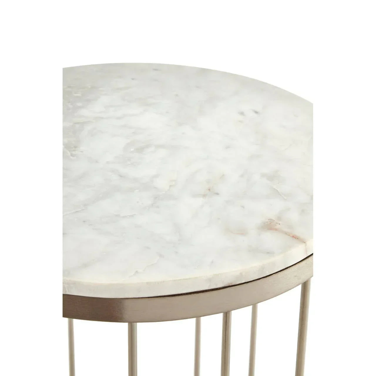 Round marble side table with metallic frame, close-up of tabletop and edge detail