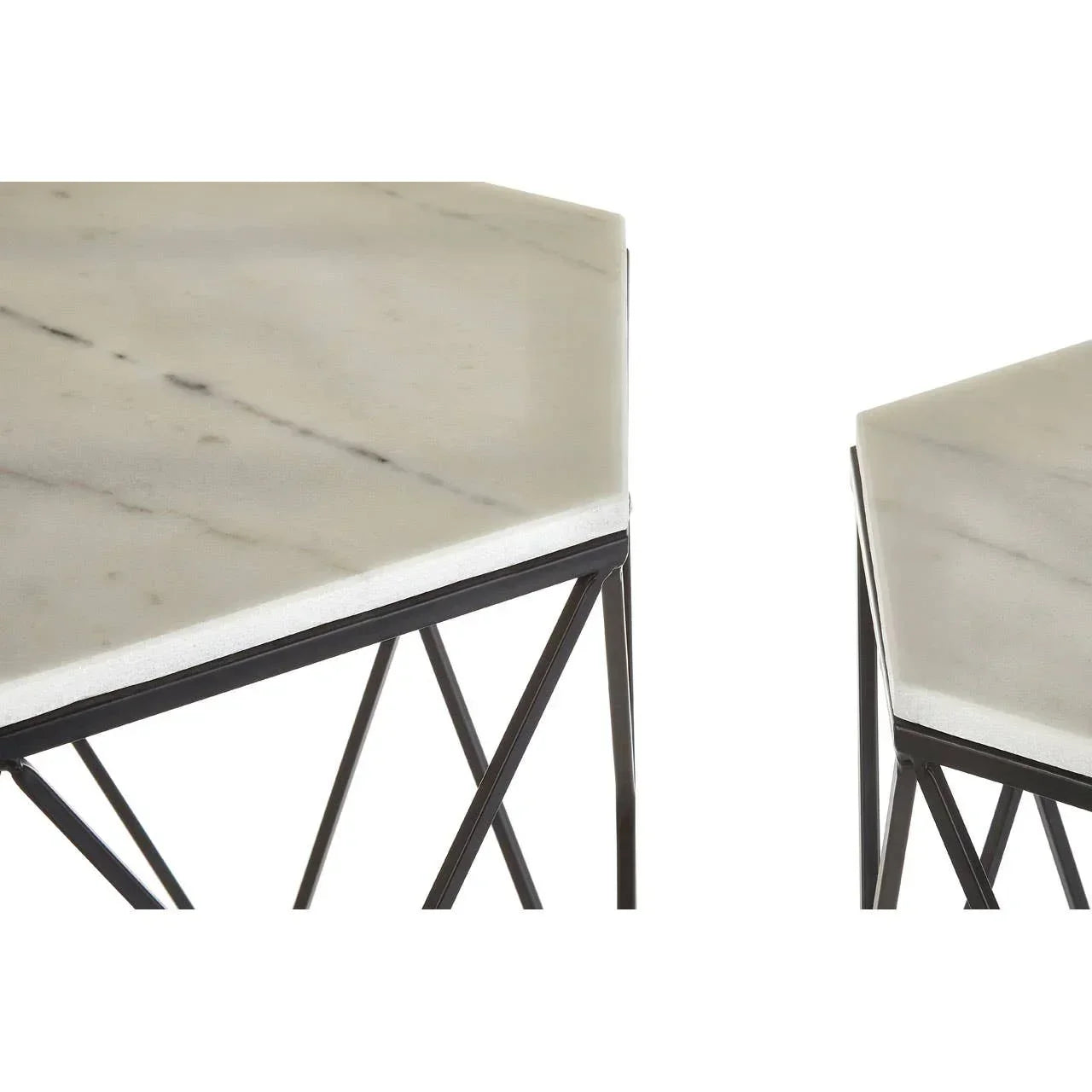 White marble side table with black metal geometric legs, close-up on corners