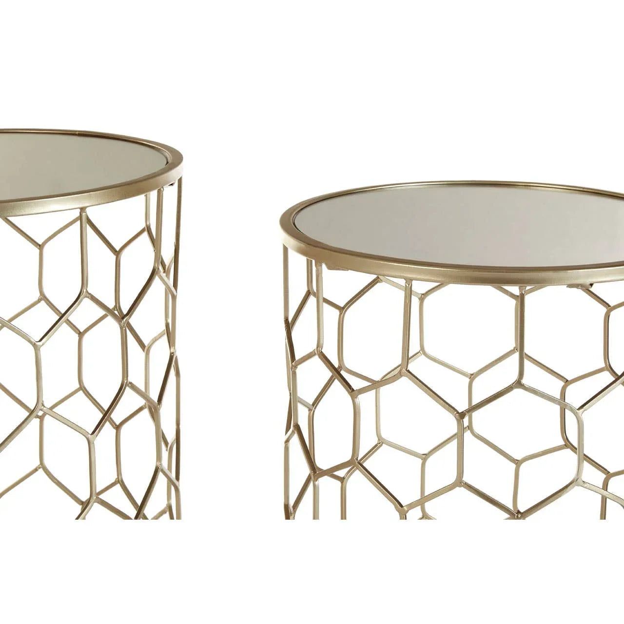 Round metal side tables with gold geometric frames and mirrored tops, close-up view