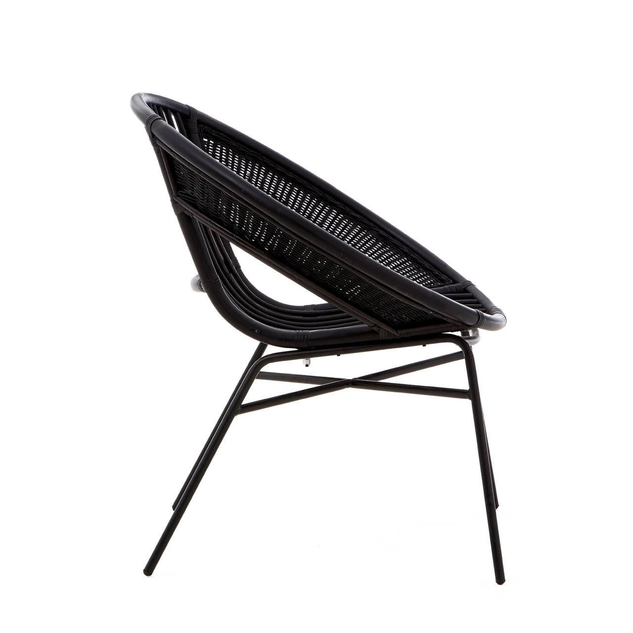 A side view of a black chair featuring a natural rattan seat and a sturdy iron frame, showcasing a modern design with a curved backrest and sleek legs