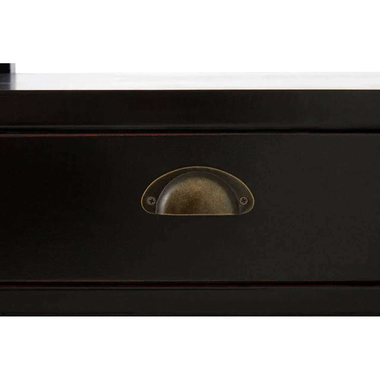 Black wooden drawer with antique brass cup handle closeup