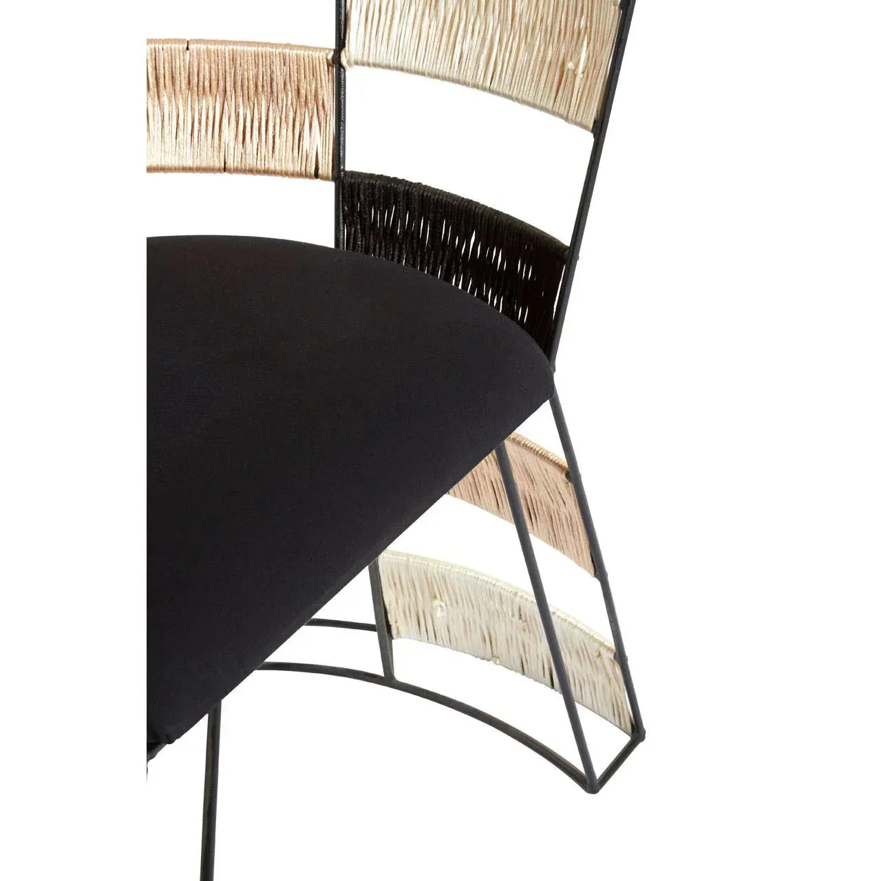 Modern accent chair with black seat, woven rattan backrest and metal frame closeup