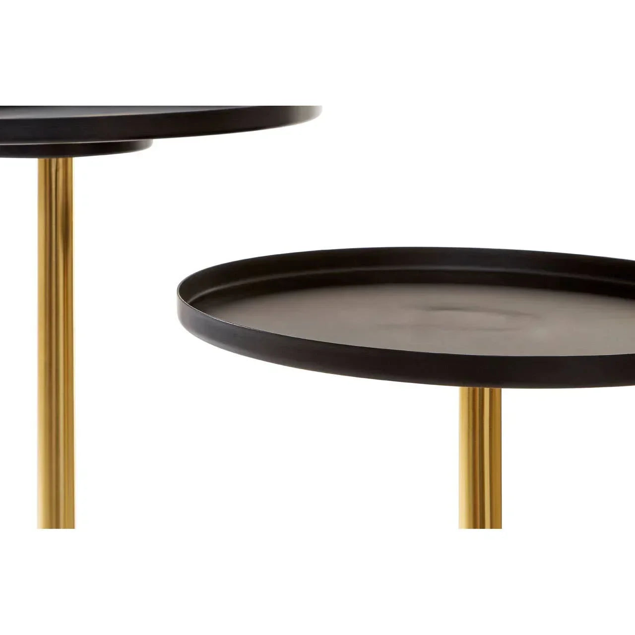 Round black metal side table with raised edge and gold legs, close-up view