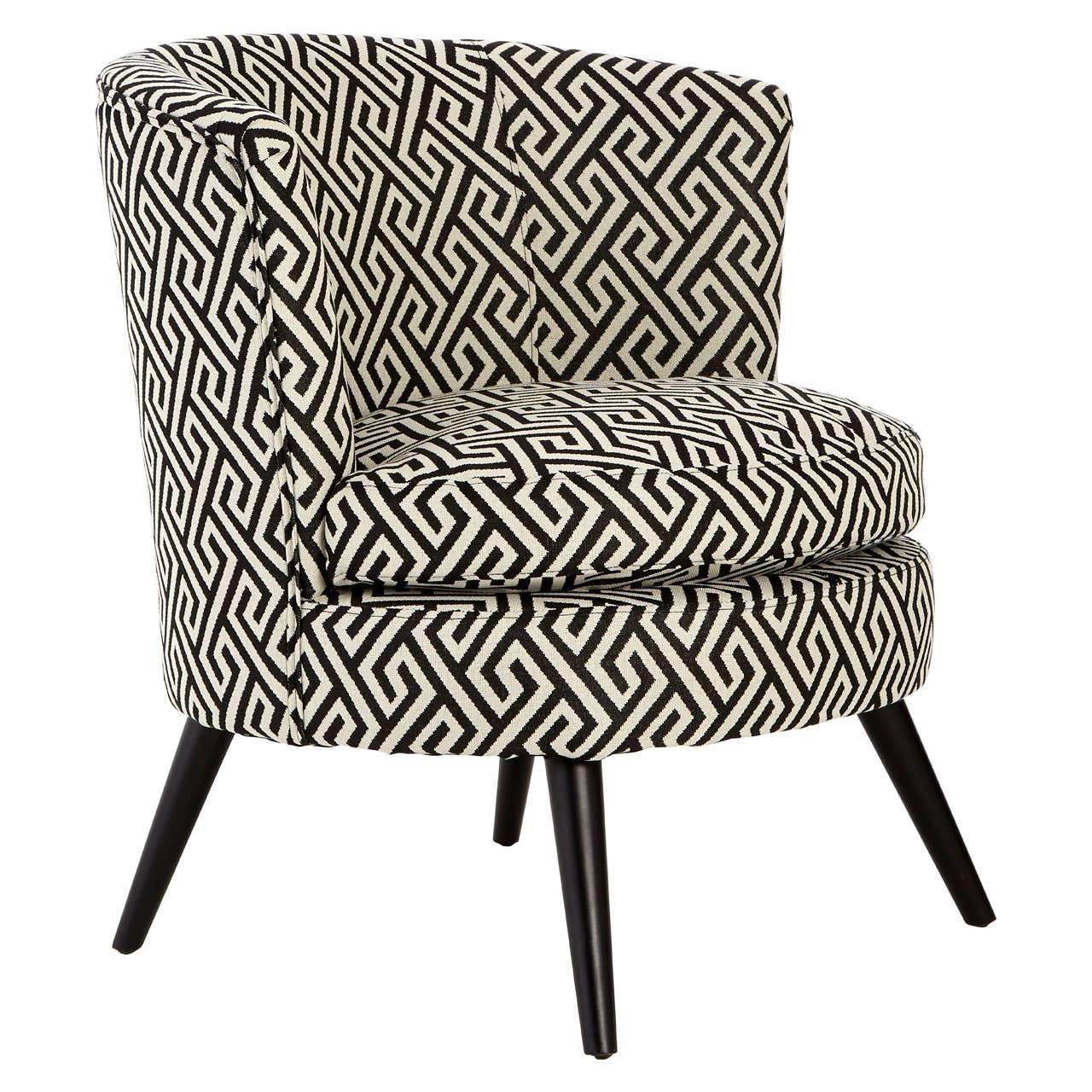 Geometric patterned accent chair with black wooden legs and curved backrest