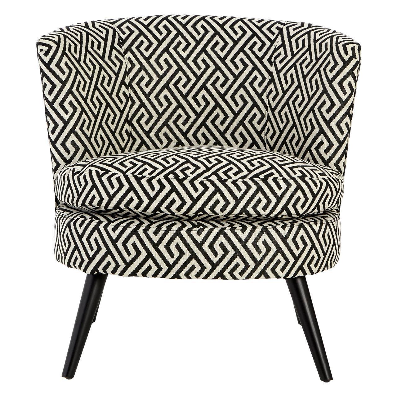 Black and white accent chair with geometric fabric and black angled legs, front view
