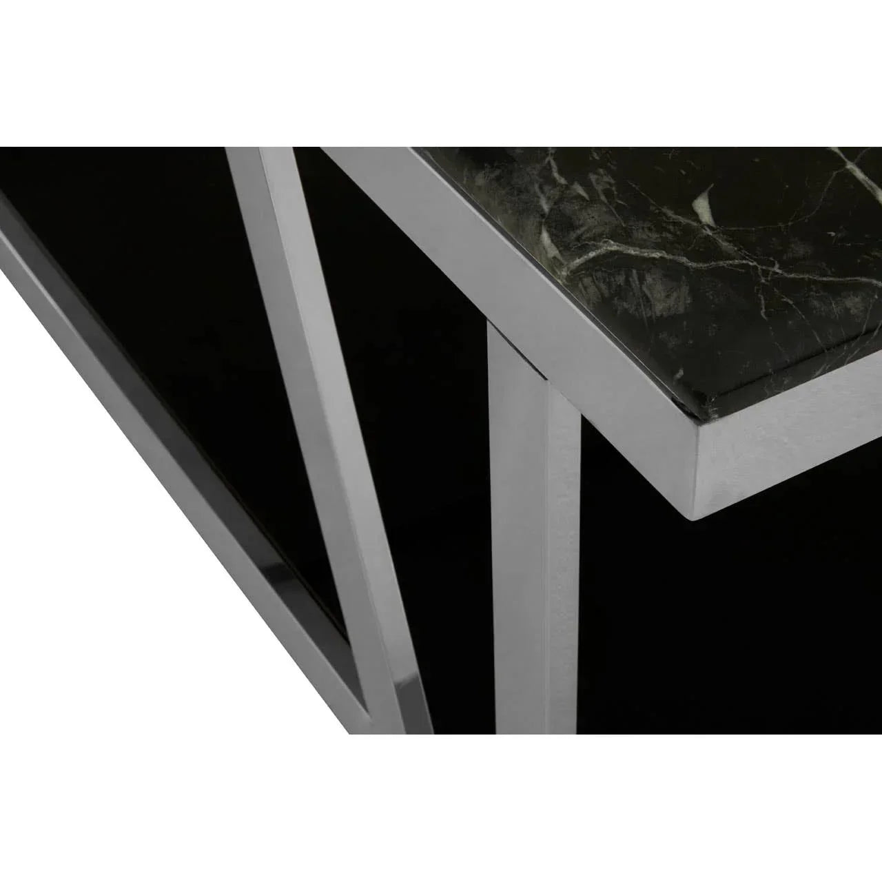 Close-up of black marble top console table with silver metal frame