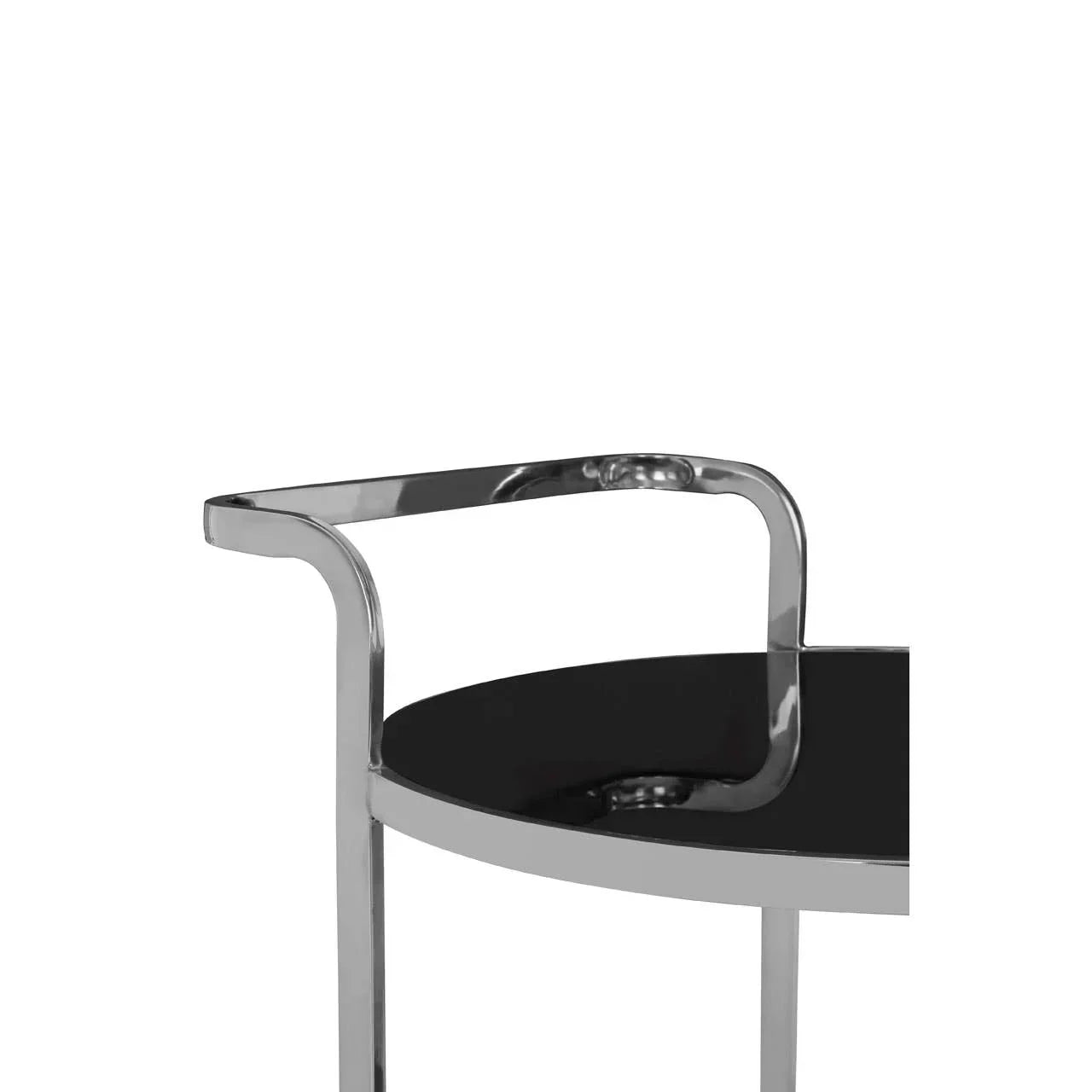 chrome side table with black glass top close-up on handle and edge