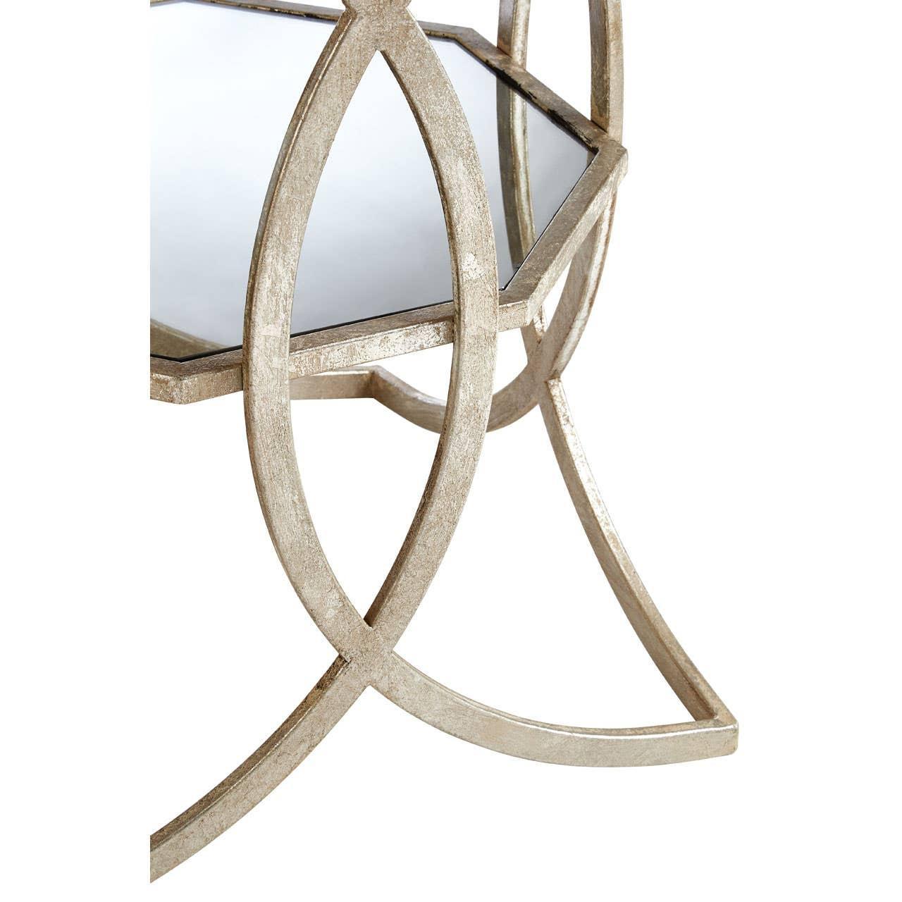 Gold metal side table with mirrored top and geometric base detail
