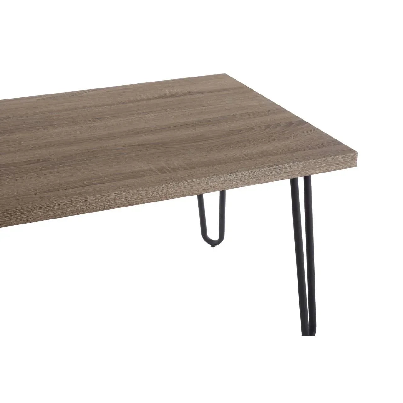 Closeup of wooden dining table top with black metal hairpin legs