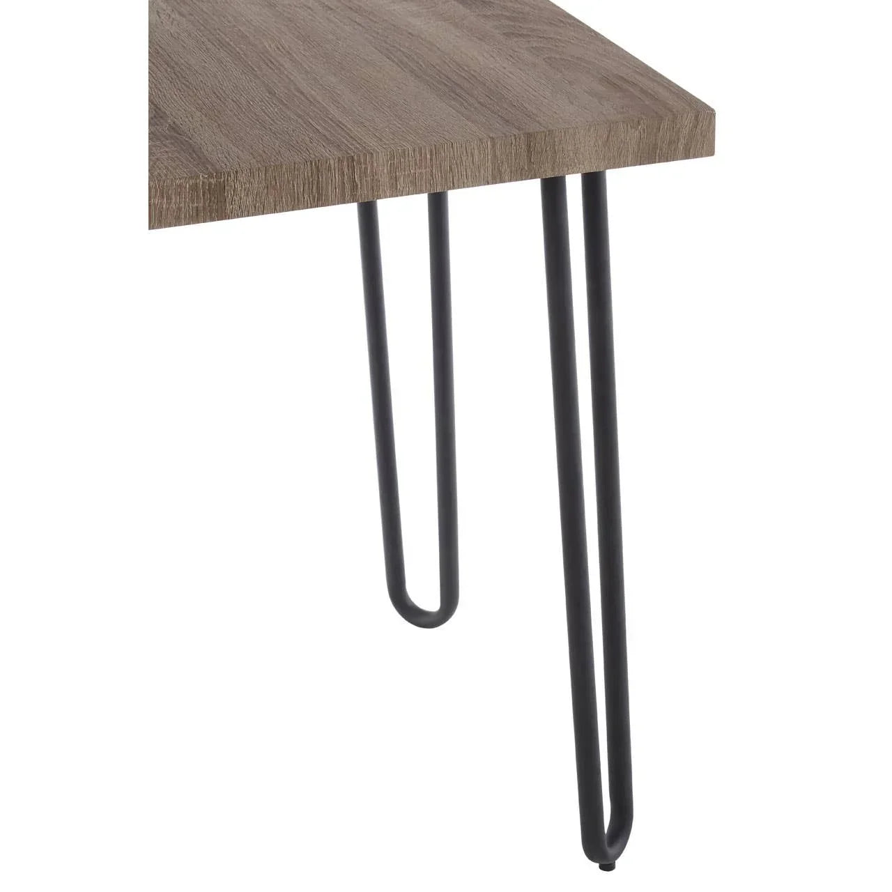 Wood tabletop with black metal hairpin legs, close-up corner furniture detail