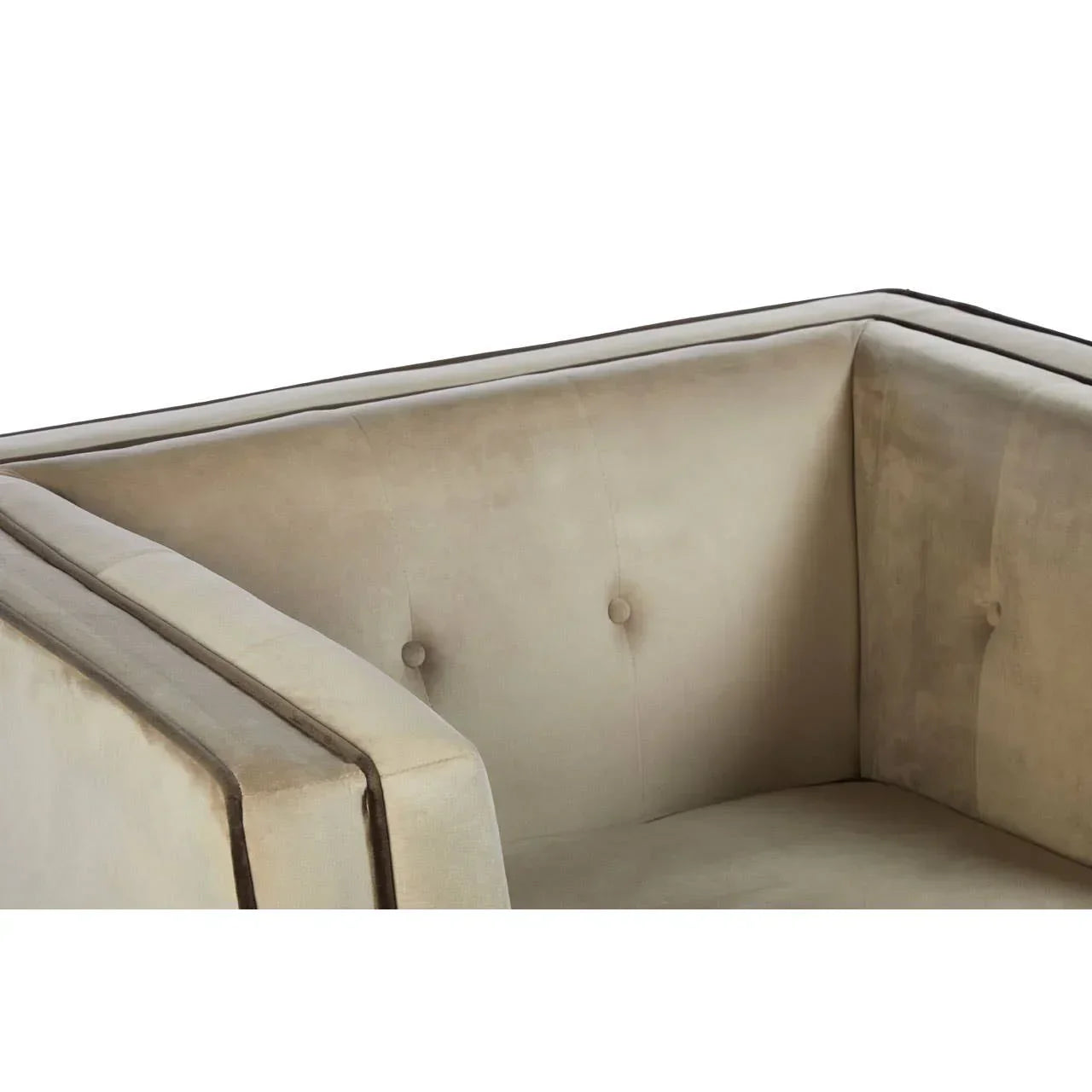 Close-up beige velvet sofa with button-tufted backrest and square arm detail
