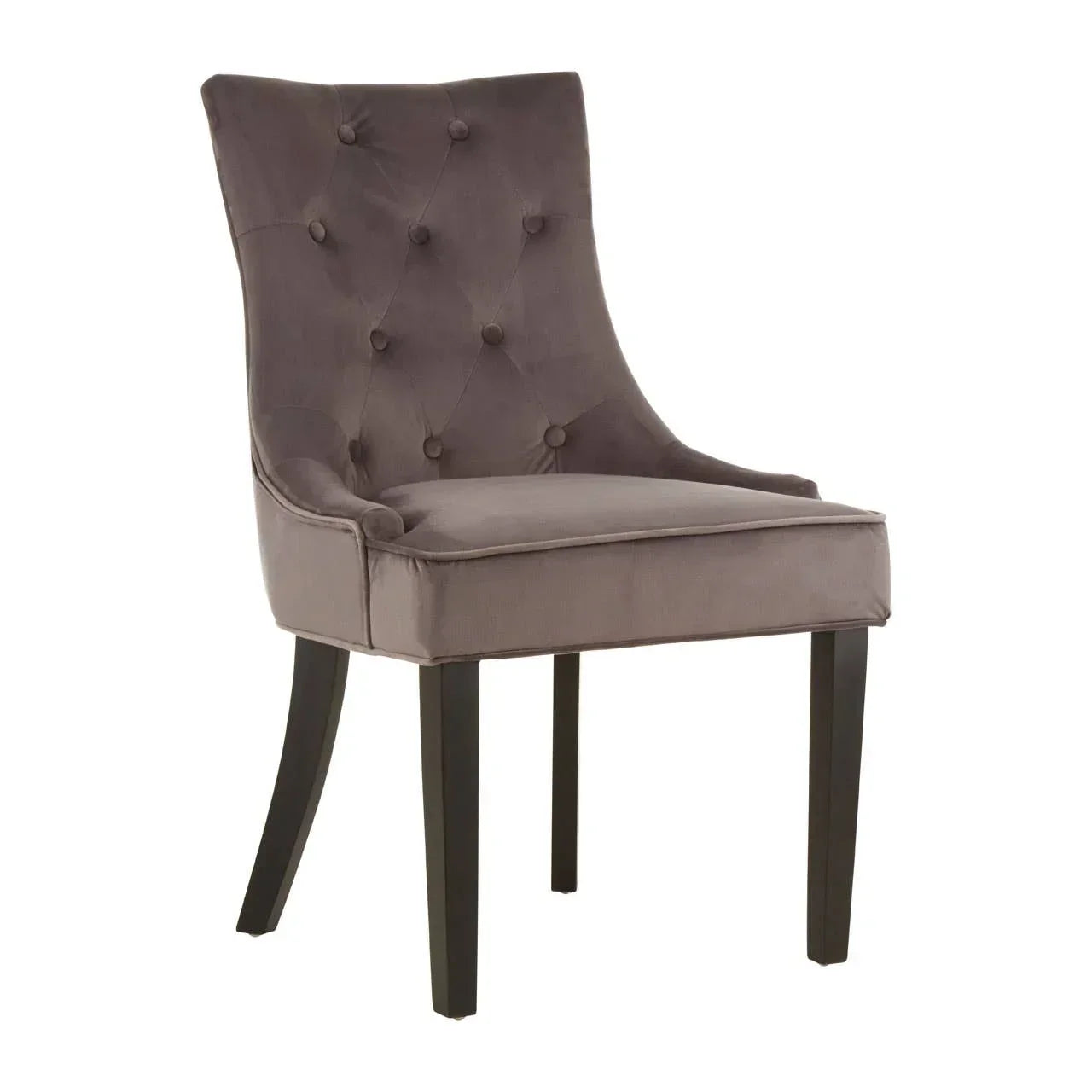 Grey velvet dining chair with tufted backrest and dark wooden legs, angled front view