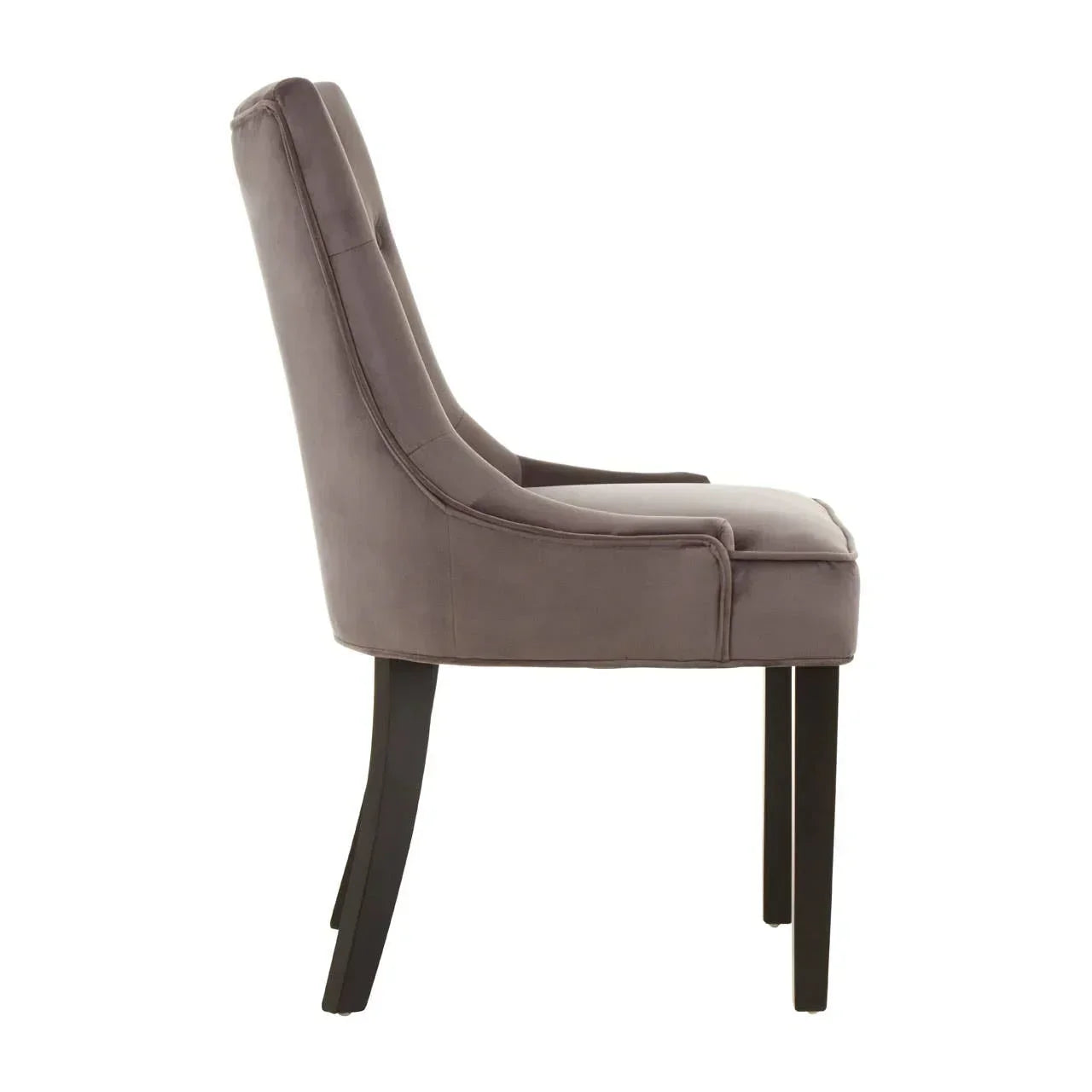 Side view of grey upholstered dining chair with cushioned seat and dark wooden legs