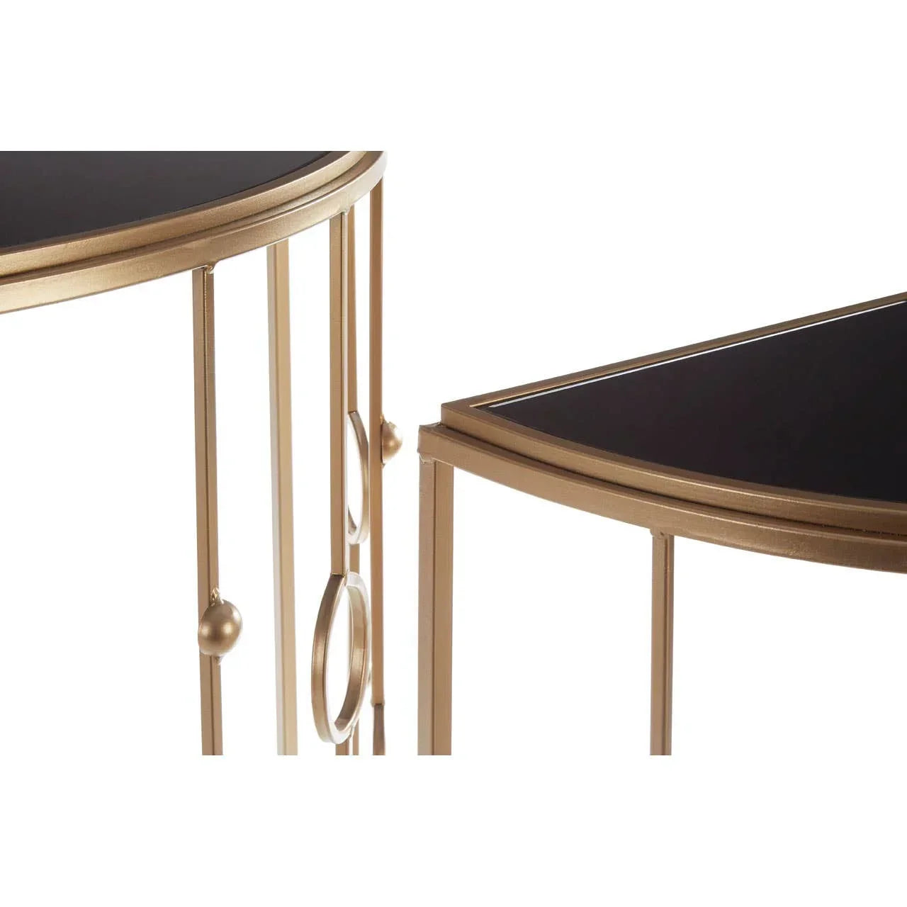 Black glass console table with gold metal frame and decorative geometric accents, side angle view