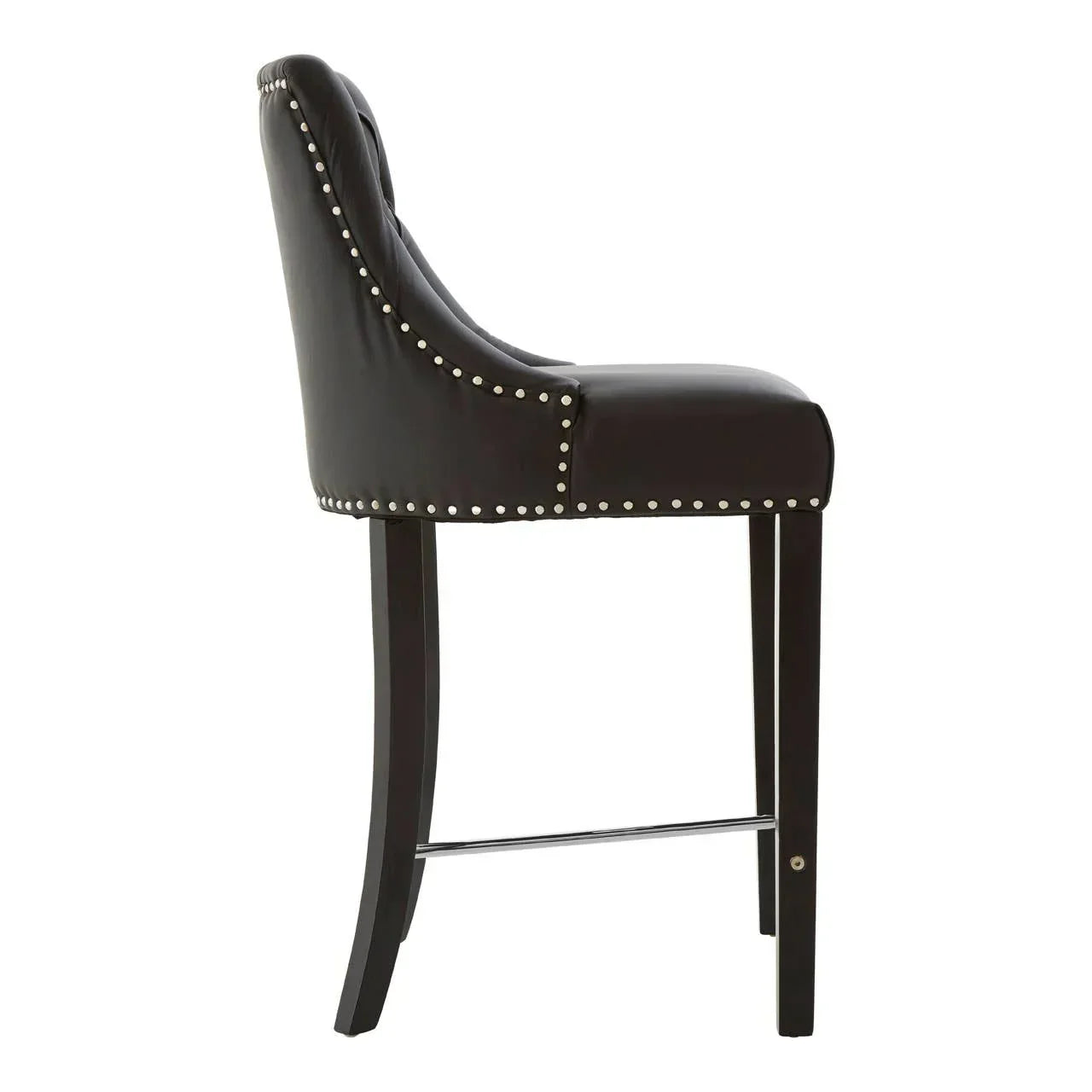 Brown leather bar stool with studs, side view, padded seat and dark wooden legs