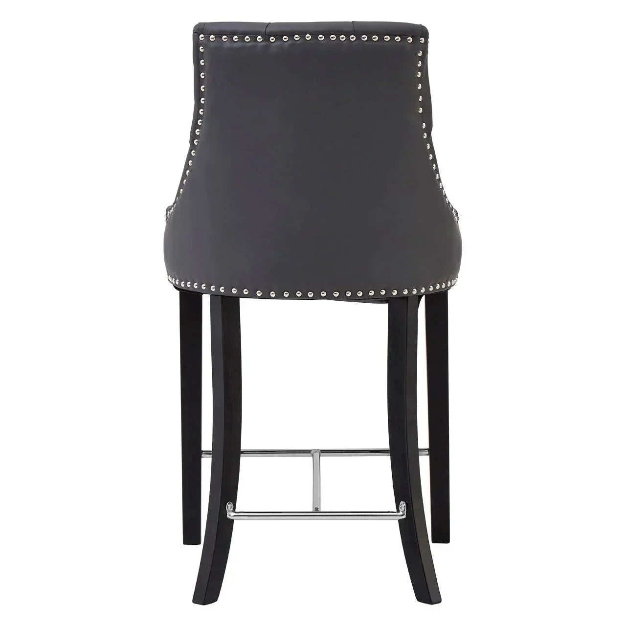 Back view of grey bar stool with silver stud trim and black wooden legs