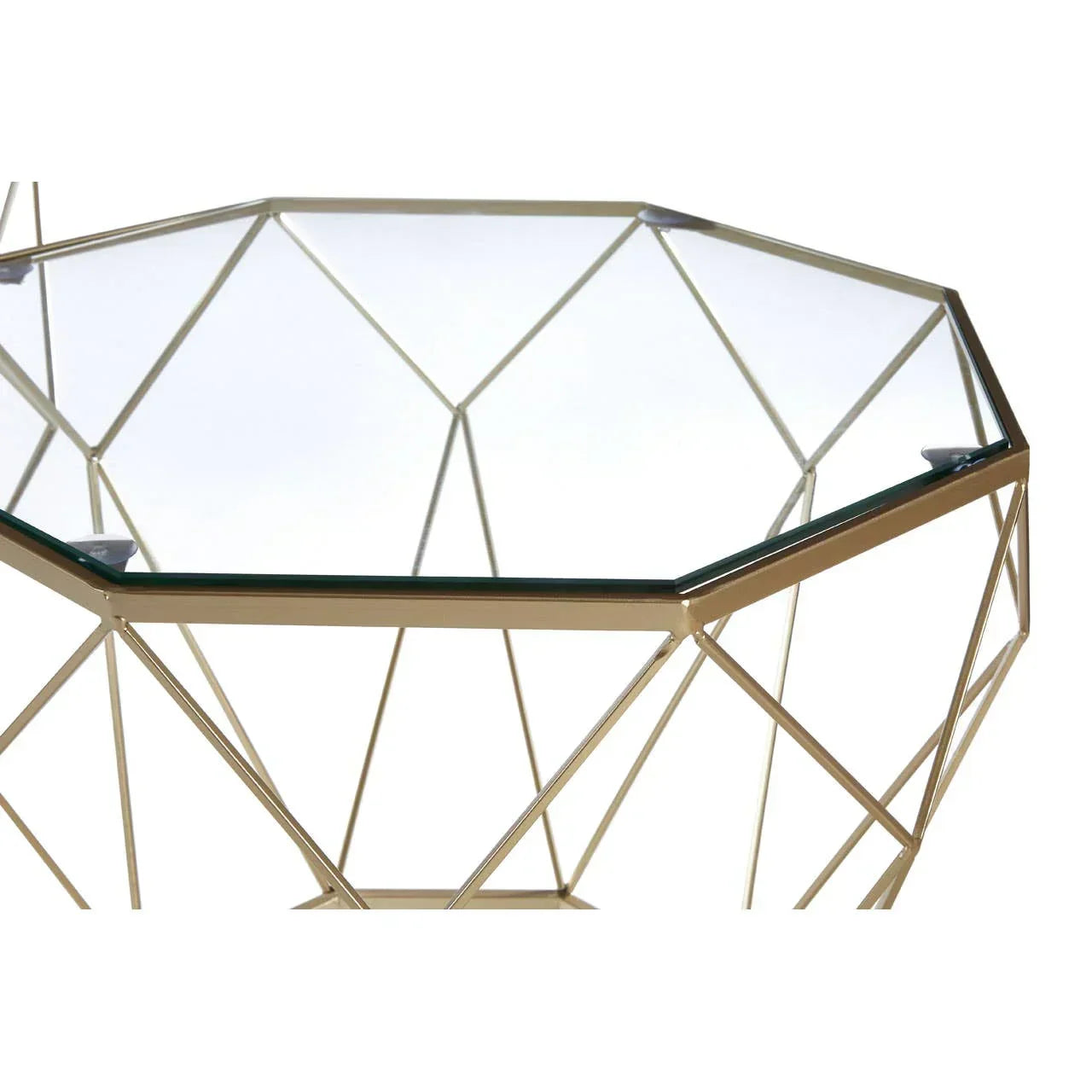 Geometric gold metal coffee table with clear glass top, angled view