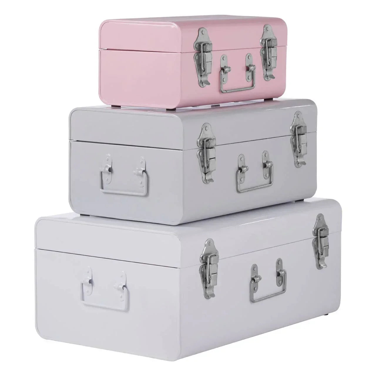 Set of three metal storage trunks in pink, grey, and white stacked on white background