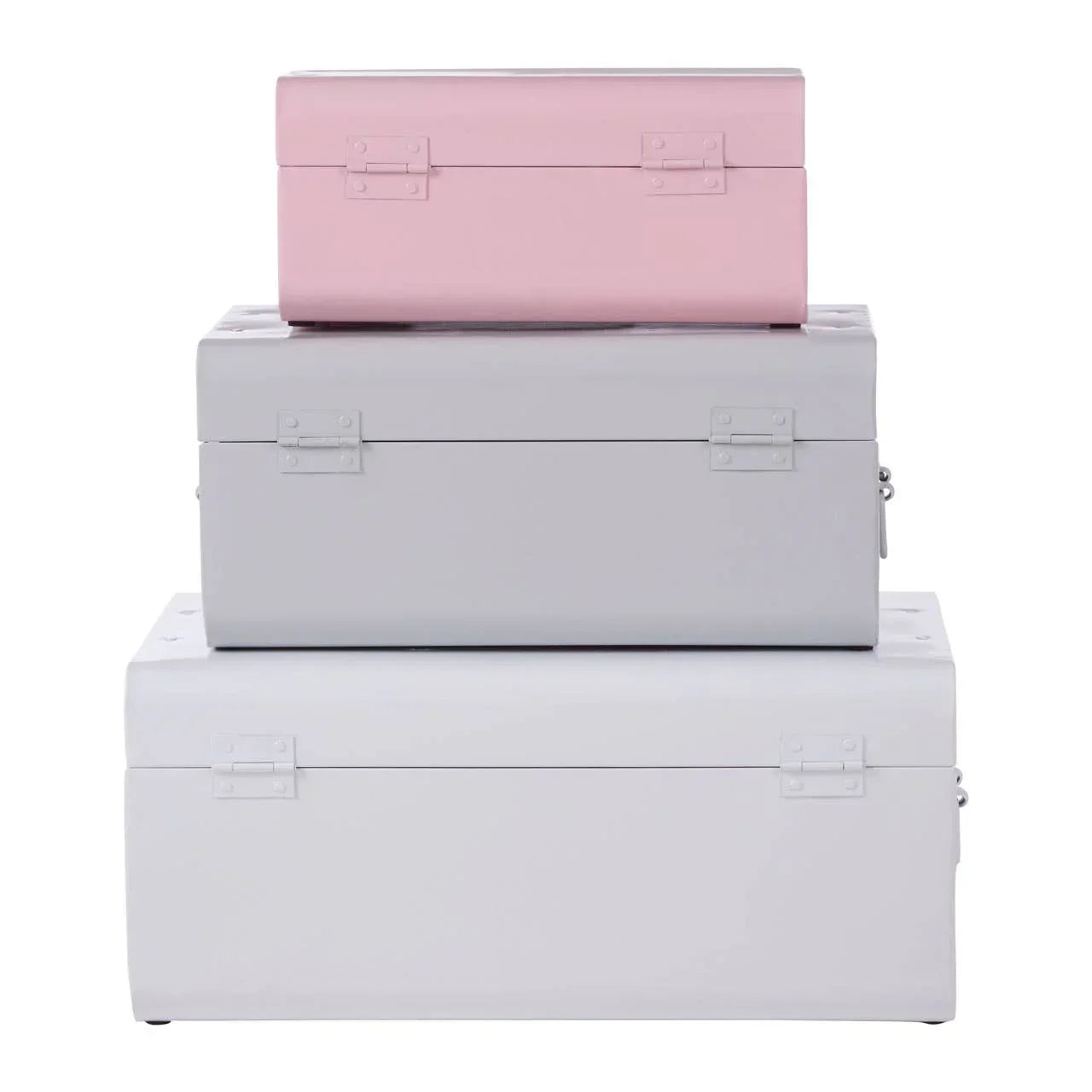 Set of three metal storage trunks in pastel pink and grey, stacked in size order